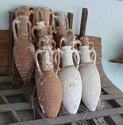 Bronze Age amphorae from shipwrecks near Bodrum, Turkey, with rack and roping device illustrating how they might have been kept from shifting