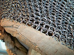 Close up detail of Mughal riveted mail hood kulah zirah, 17th century, alternating rows of round riveted rings and solid rings.