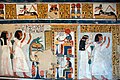 A vivid relief of Roy and his wife before Horus and Hathor