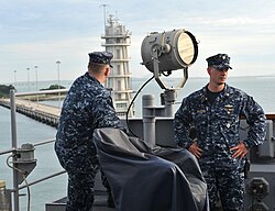 US Navy sailors in navy blue camouflage