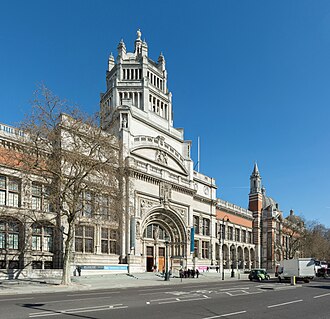 Perspective photograph of the museum's main Cromwell Road entrance on a clear day with a blue sky.