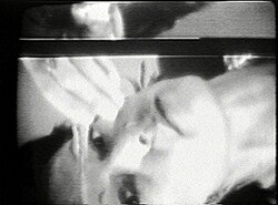 Joan Jonas during a performance documented on video and installed, 1972