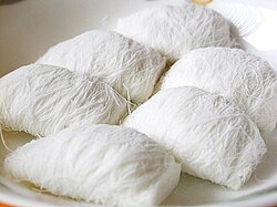 Kkul-tarae, fine strands of honey and maltose, often with a sweet nut filling