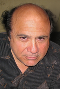 A smiling Danny DeVito