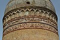 A tomb tower in Lajim, dated 1022/23, with its upper Middle Persian inscription in a script derived from Book Pahlavi.[32]