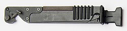 L3A1 scabbard. Note the lug to attach the bayonet for wire cutting.
