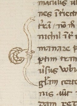 a hand holds a snake bracketing 7 lines of text