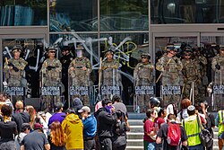 California National Guard and protestors during June 2025 Los Angeles protests against mass deportation.