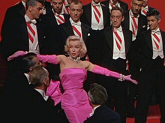 Pink combined with black or violet is associated with seduction. Marilyn Monroe in the trailer for the film Gentlemen Prefer Blondes (1953).