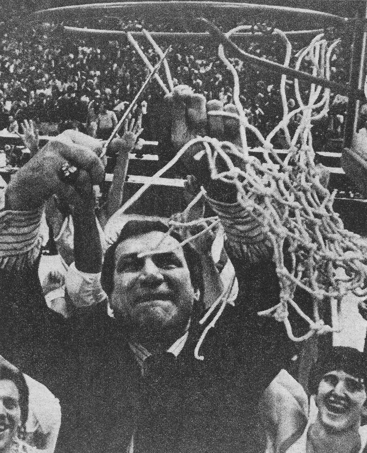 Dean Smith cutting down the nets, Duke Chronicle 1982-12-03 page 21.jpg