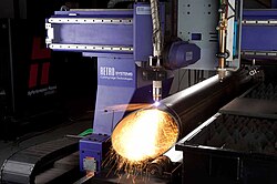 A plasma CNC pipe cutting machine