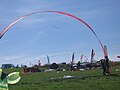 Specialized arch-ribbon (non-rotating), wind bow, or wide stiffened-ribbon kite