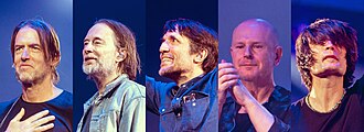 A montage of the members' faces