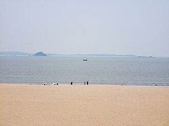 View of Binlang Islet from Xiamen's One country, two systems beach (center left)
