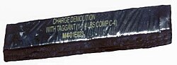 A 1.25 lb (570 g) demolition charge of C4 explosive