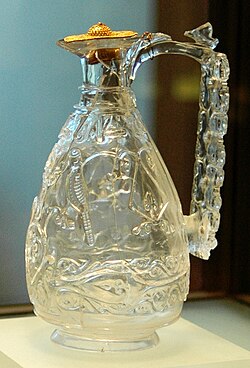 Fatimid ewer in carved rock crystal (clear quartz) with gold lid, c. 1000