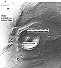 Great amounts of water were required to carry out the erosion shown in this Viking image. Image is located in Lunae Palus quadrangle. The erosion shaped the ejecta around Dromore.