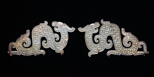 Jade dragon pendants, Zhou dynasty, China. 200–1000 BCE[78]