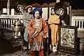 Princess Mỹ Lương, eldest daughter of emperor Dục Đức seated in front of Bình phong
