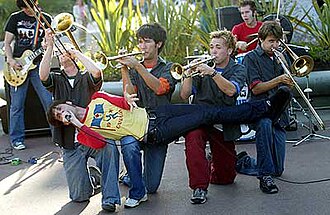 Suburban Legends in 2002. (Left to right: Brian Klemm, Brian Robertson, Vince Walker, Aaron Bertram, Derek Rock, Dallas Cook. Across: Tim Maurer. Not pictured: Chris Maurer.)