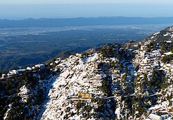 View of Mussoorie in winter, with the Doon Valley in the distance