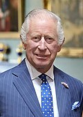 King Charles III in a suit