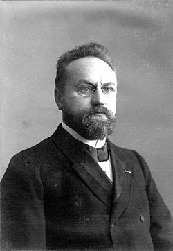 Black and white head shot of Bavinck