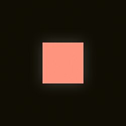 A peach-colored square on a black background, with a faint glow emanating from it