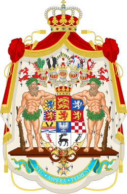 Highly ornate coat of arms of the Duchy of Brunswick with a crowned, multi-quartered shield and two human supporters.