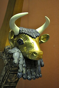 Sumerian volutes at the end of the strands of a bull mascaron of the queen's lyre, one of the Lyres of Ur, 2600 BC, wood, lapis lazuli, limestone (red), bitumen, gold, shell, British Museum[16]