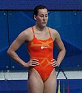 A woman wearing a one-piece swimsuit