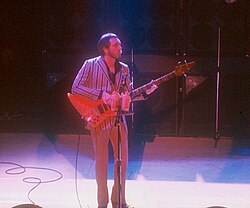 John Entwistle playing a bass guitar
