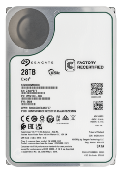 Front of hard disk with white sticker and black text. Top left a darker circle area